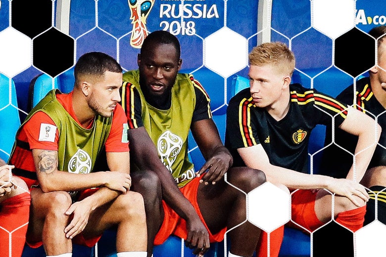 Eden Hazard of Belgium talks with teammates Romelu Lukaku and Kevin De Bruyne.